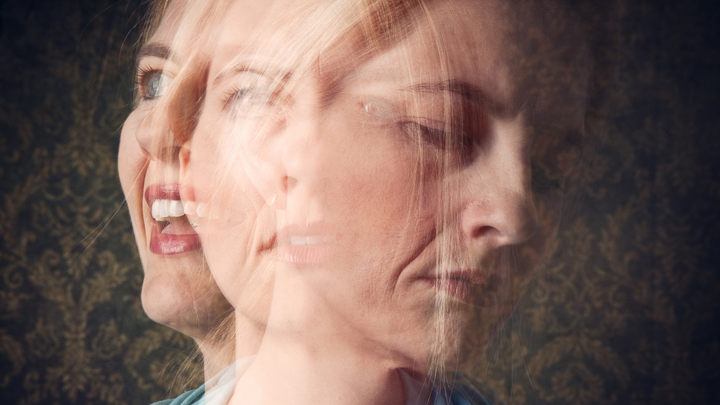 Multiple-exposure photograph of a woman's face showing different emotional states simultaneously, visually representing hormonal mood swings and emotional shifts throughout the cycle